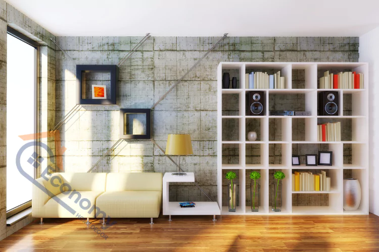 An image demonstrating "Bookshelf Decorating Ideas" with a white modular bookshelf displaying books, vases, framed pictures, and speakers in an organized and aesthetic way.