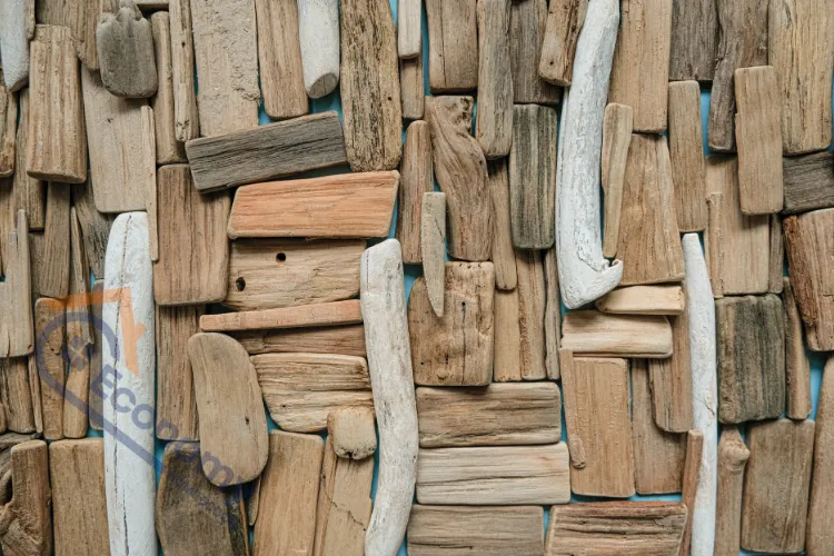 An image demonstrating "Driftwood Decor Ideas," showcasing a wall panel or art made from salvaged driftwood pieces of varying tones and textures.