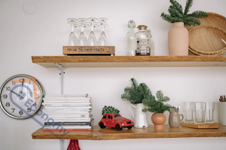 An image demonstrating "Shelf Decor Ideas," showcasing two rustic wooden shelves with a variety of items, from books and a clock to decorative objects and glassware.