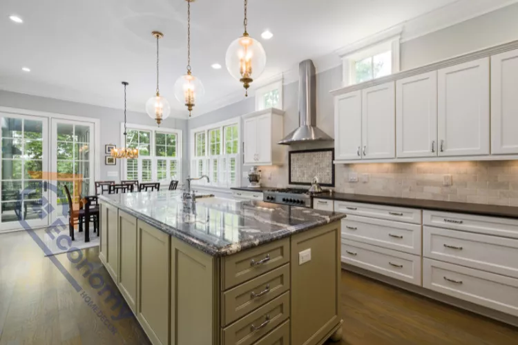 Elegant Colonial kitchen decor with white cabinets, marble countertop, and classic pendant lighting.