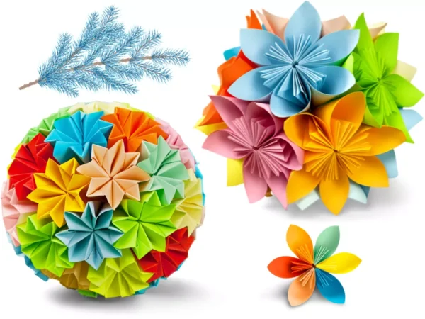 Colorful Modular Origami Paper Decoration Set Set of colorful modular origami paper decorations, including a large sphere, a flower cluster, and an individual flower, with a blue frosted pine branch.