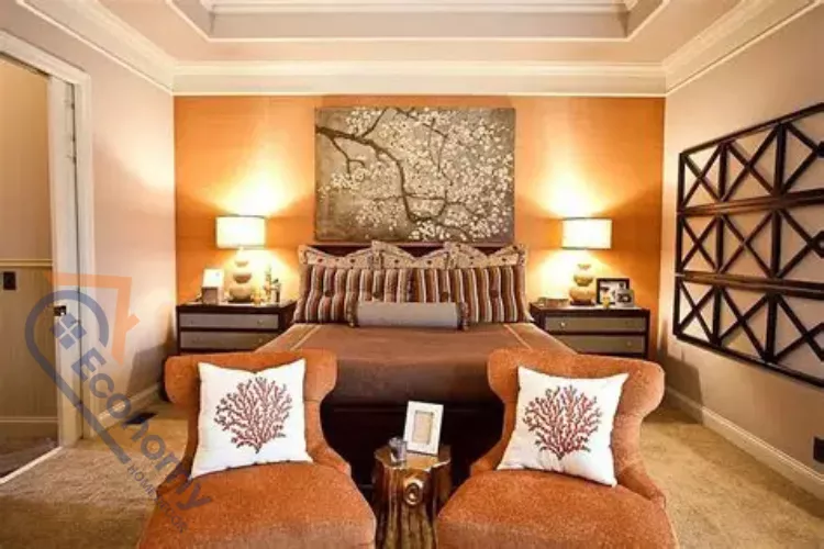 A warm and inviting bedroom showcasing Orange Bedroom Decorating Ideas, featuring an orange accent wall behind the bed.