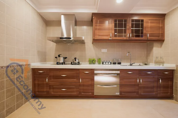 A traditional kitchen showcasing a mix of dark wood cabinetry and a neutral tiled backsplash, suggesting Colonial Kitchen Decorating Ideas.