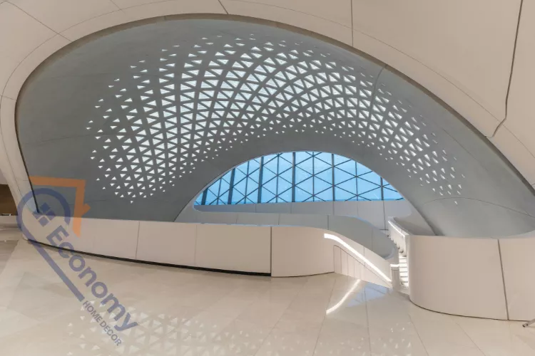 A bold curved wall decor idea featuring a dark, textured wall with a large, statement circular mirror centered on it.