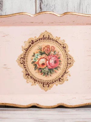 Vintage Shabby Chic Hand-Painted Serving Tray Ornate vintage shabby chic serving tray in distressed pink and cream with gold trim and a central floral bouquet decal.