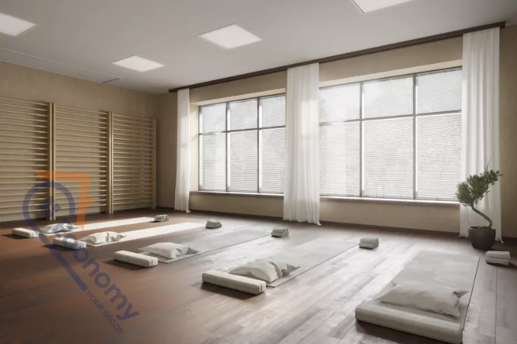 A dedicated meditation corner showcasing Yoga Studio Decor Ideas with low seating, cushions, and ambient lighting.