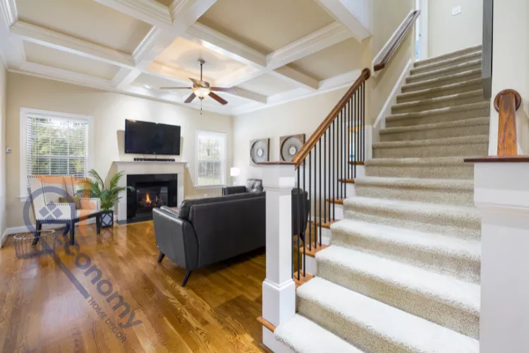 A traditional basement decorating idea featuring a large, dark-colored sofa and classic wooden furniture pieces.