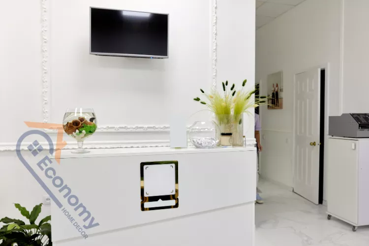 A traditional living room featuring black, built-in cabinets as decor ideas for an entertainment center around a fireplace.