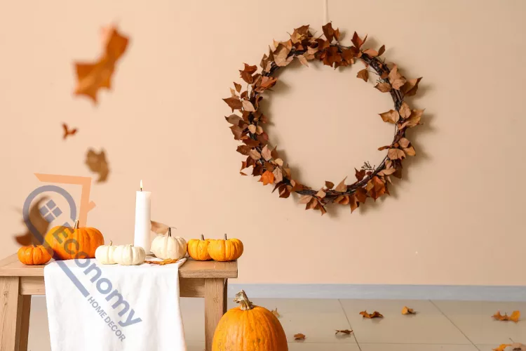 A cozy Thanksgiving decoration idea featuring a fireplace mantel adorned with small pumpkins, gourds, and candles.